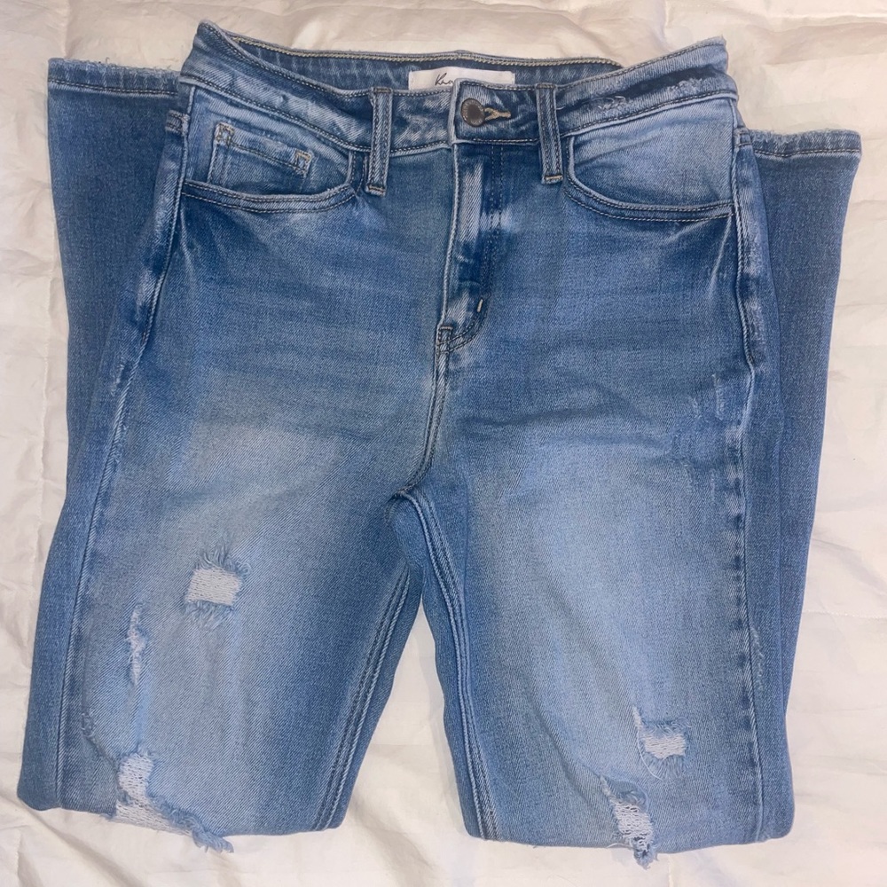 High Rise distressed skinny jeans.